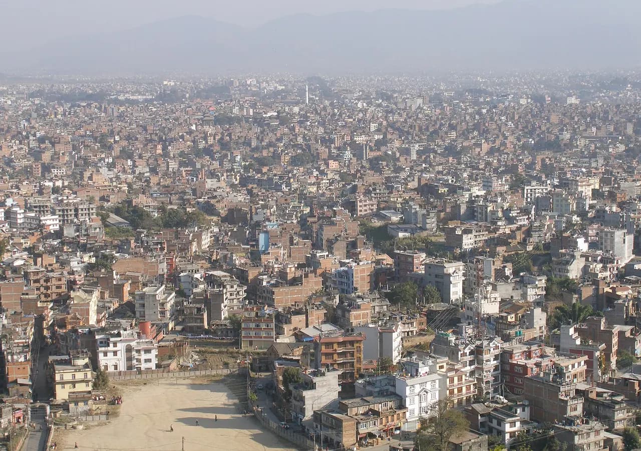 View across Kathmandu from Swayambhunath. Location context only; this is not a photograph of the Compassion in Everyday Life event.